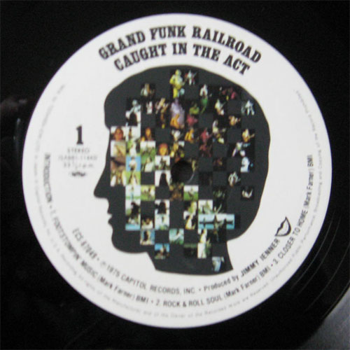 Grand Funk Railroad / Caught In The Actの画像