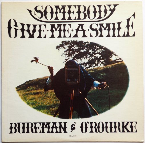 Bureman & O'Rourke / Somebody Give Me A Smile (Signed)β